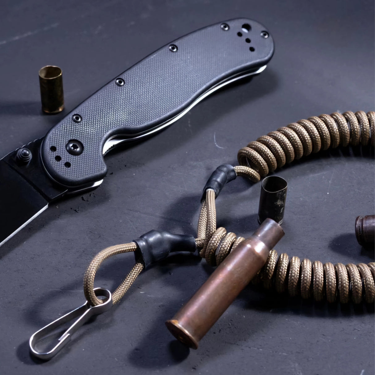 Spiral lanyard Weapon and Gear Retention with Clips