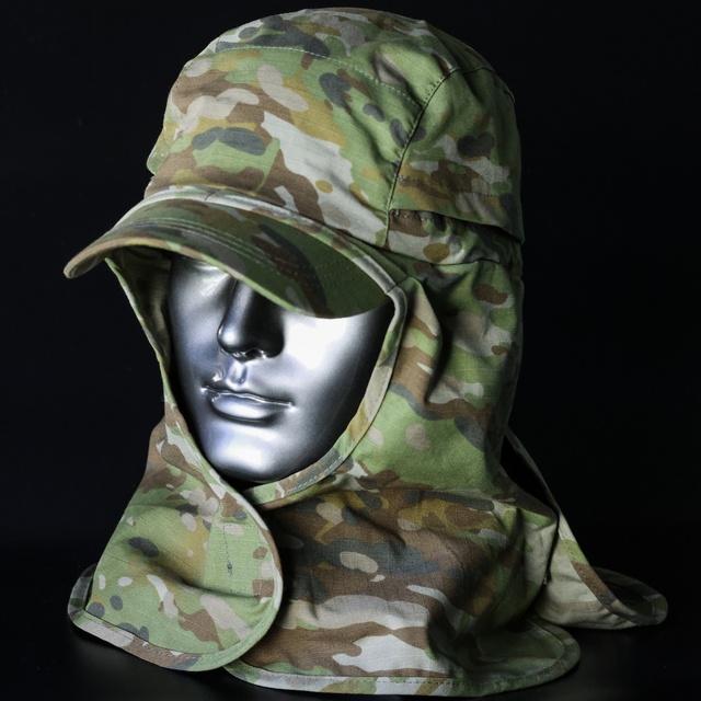 Camouflage hat on black background