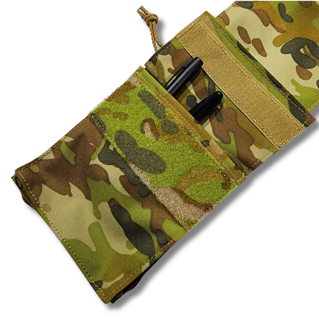 Close-up of a camouflage Notebook cover.