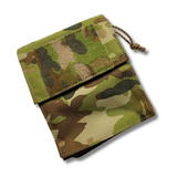 Close-up of a camouflage Notebook cover.